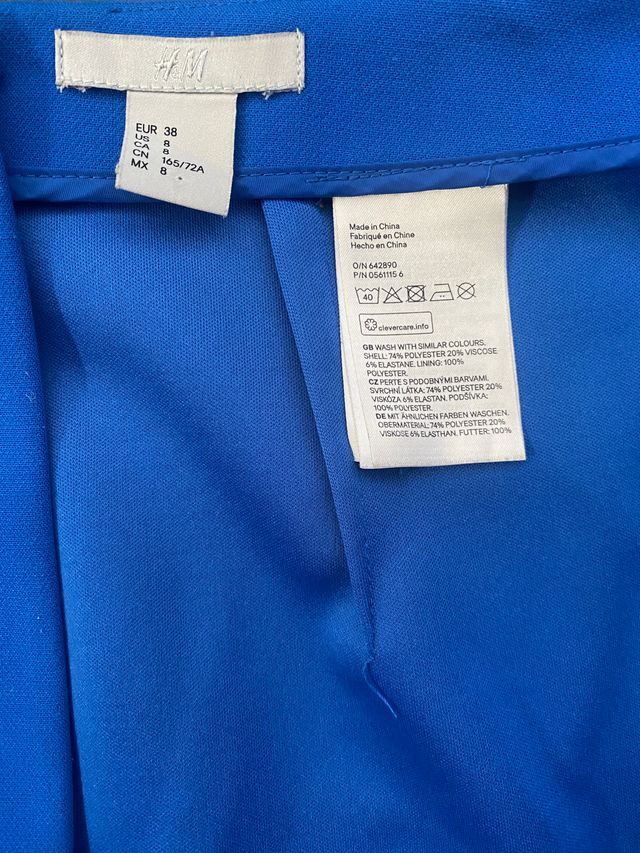 Minifalda ajustada de tela azul H & M talla 38