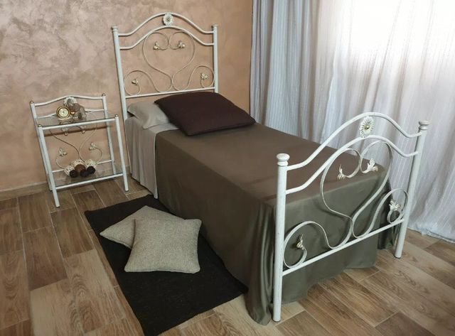 Letto Singolo in ferro battuto con rete