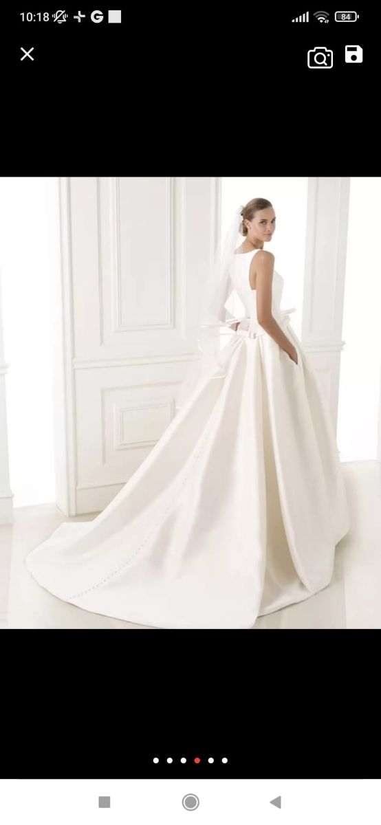  lote vestido novia.  sin estrenar, y complementos