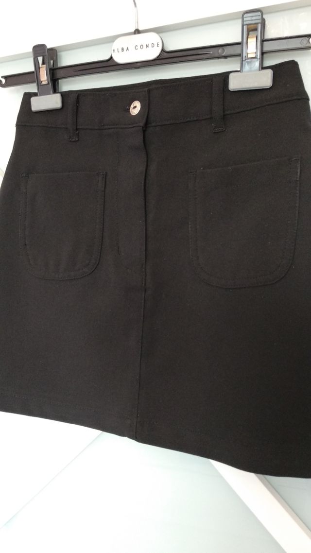 Minifalda negra con bolsillos talla 34