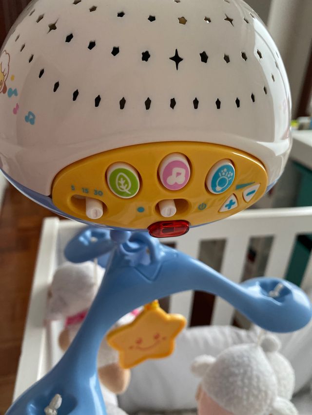 Móvil de cuna con luces y canciones