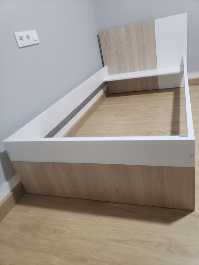 Cama dormitorio.
