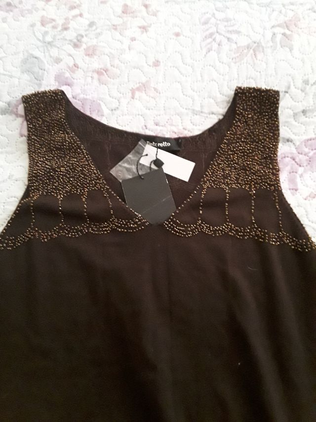 Top de punto Tintoretto