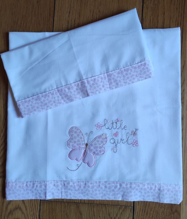 Sábana bordada y funda almohada