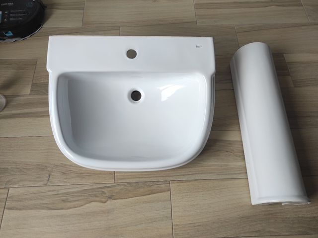 conjunto de lavabo y pie marca Roca nuevo