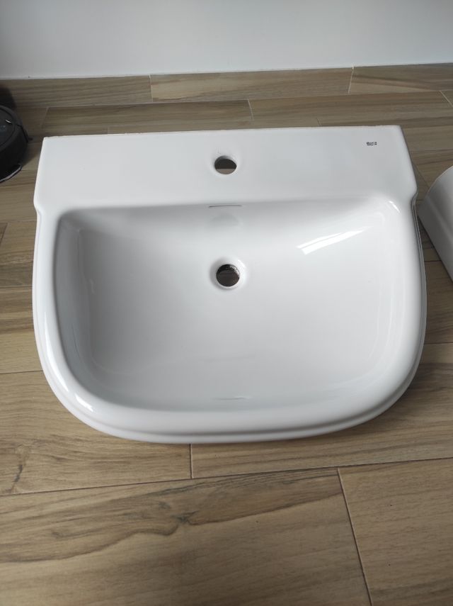 conjunto de lavabo y pie marca Roca nuevo