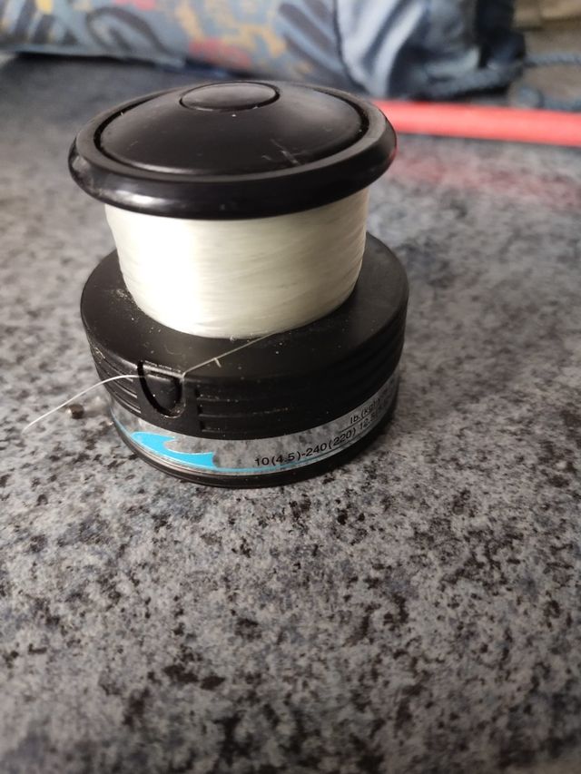 caña de pesca con carrete