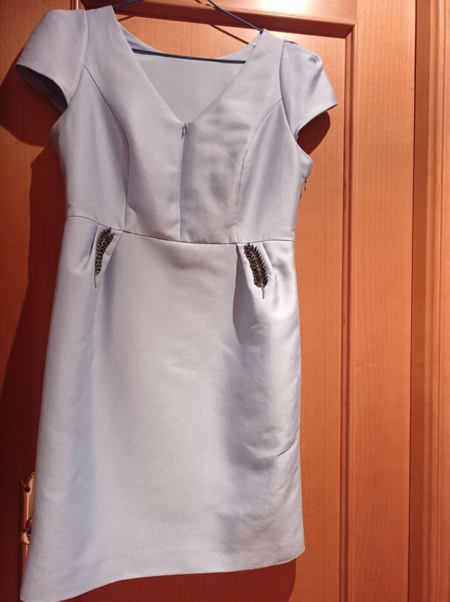 vestido,usado en una boda recién de tintoreria.