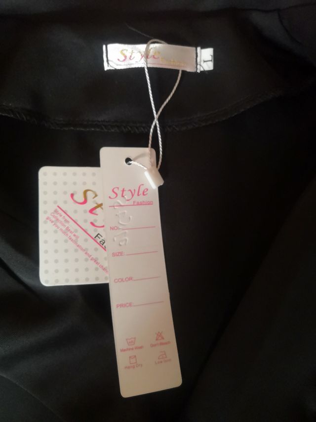 Vestido negro brillante