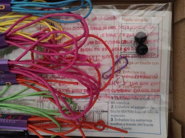 The Macrame backpack charm.