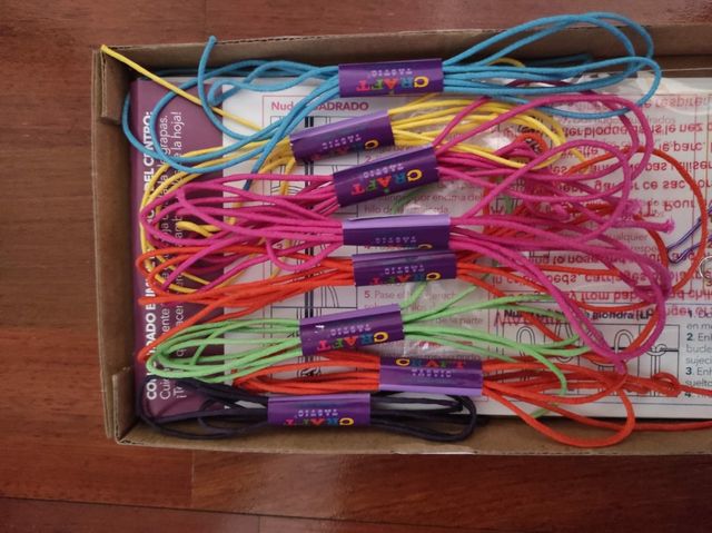 The Macrame backpack charm.