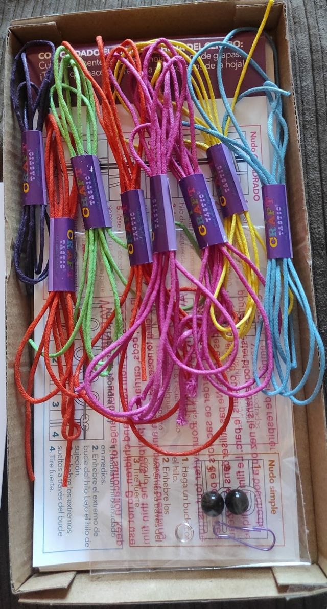 The Macrame backpack charm.