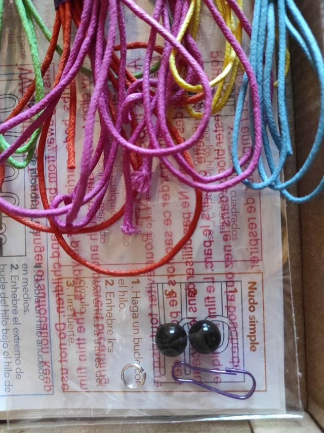 The Macrame backpack charm.