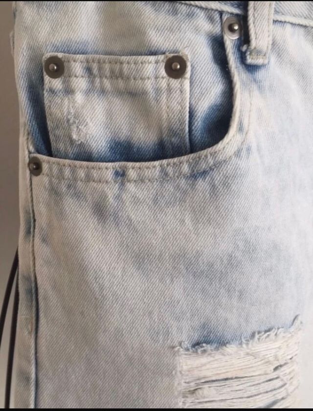 Jeans strappati taglia L 