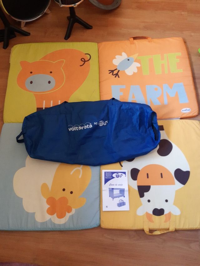 Cuna de viaje con elevador