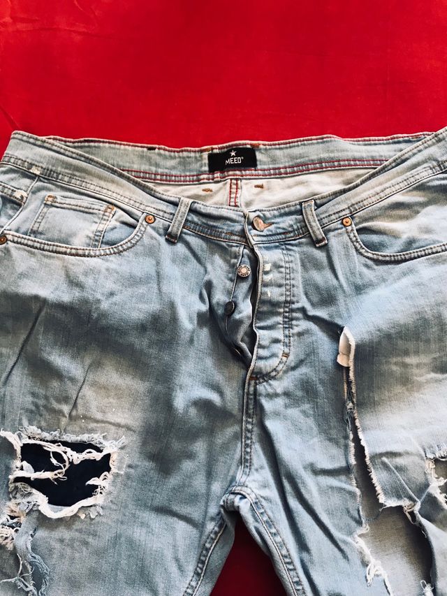 Jeans chiari strappati