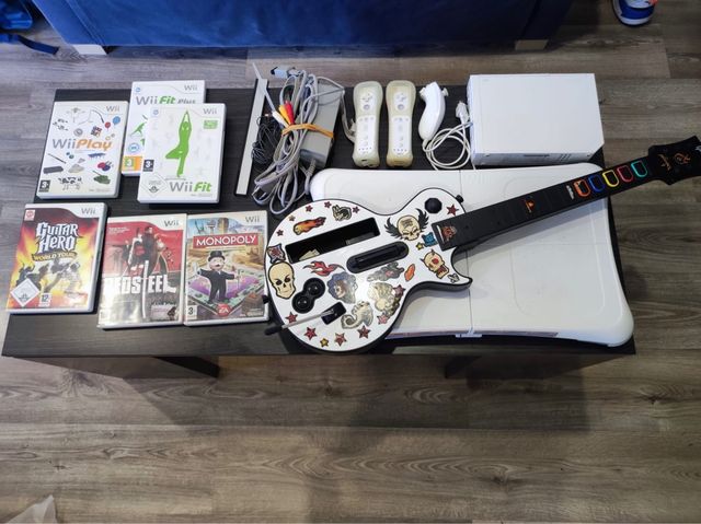 Consola WII + 6 juegos y Tabla wii