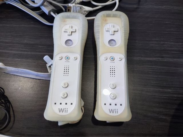 Consola WII + 6 juegos y Tabla wii