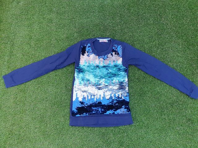 sudadera desigual niña