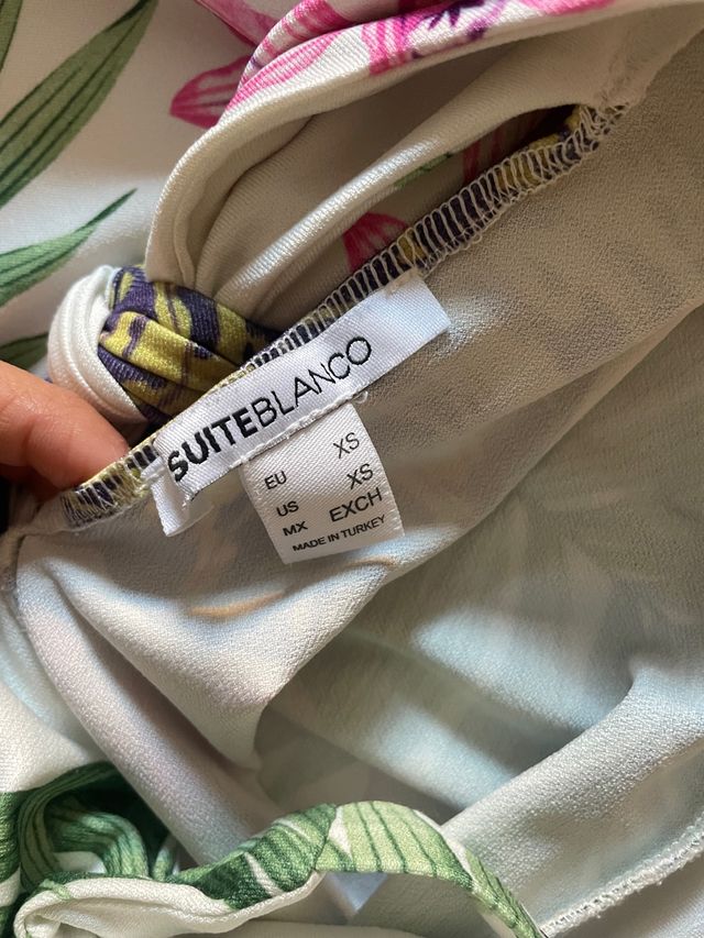 Top peplum blanco escote espalda talla xs