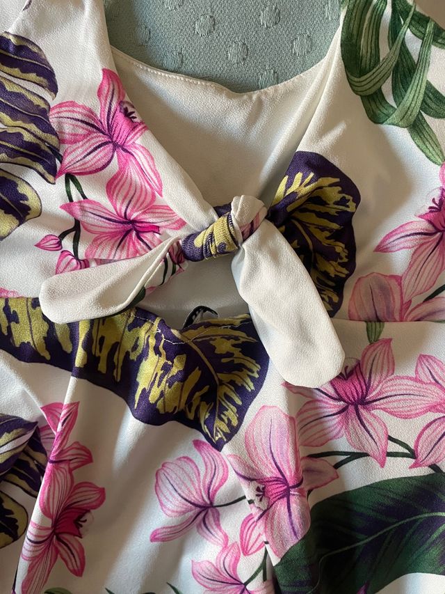 Top peplum blanco escote espalda talla xs