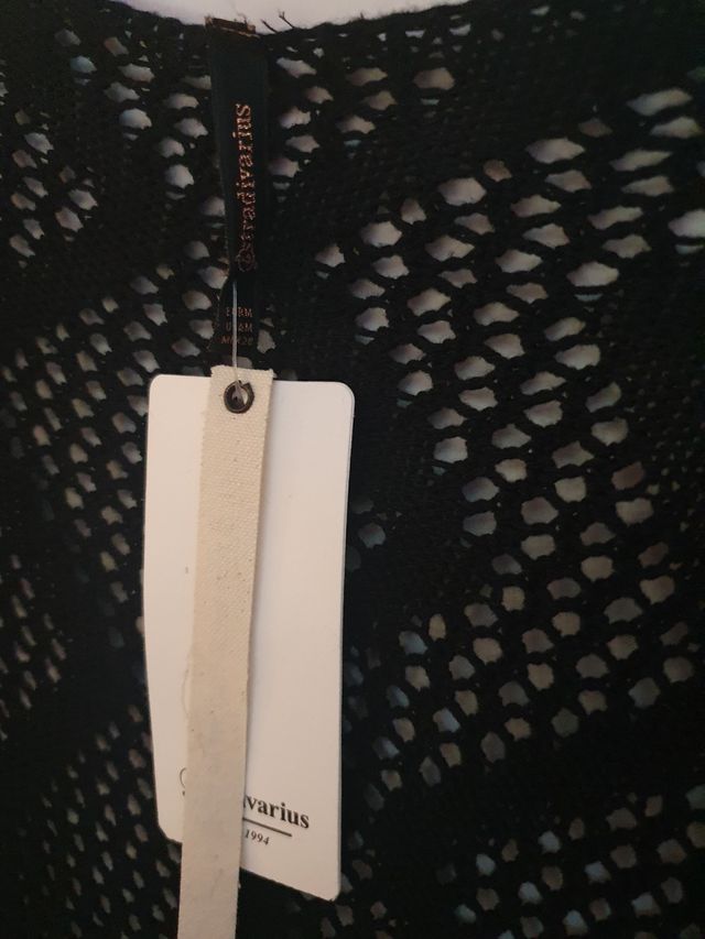 Chaleco negro calado