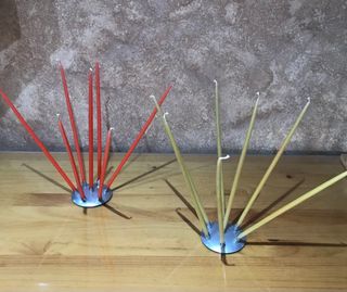Dos Soportes con 6 velas cada uno 