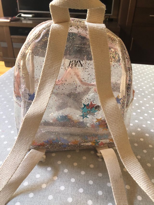 MOCHILA TRANSPARENTE CON PURPURINA DE ZARA