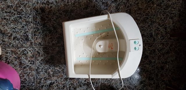 Masajeador de pies con agua. 