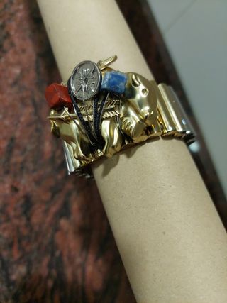 pulsera  extensible y adorno con  piedra 