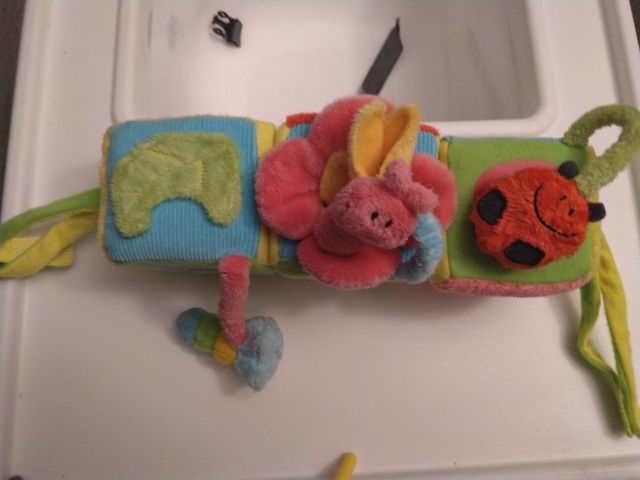 JUGUETE BARRA CARRITO BEBÉ