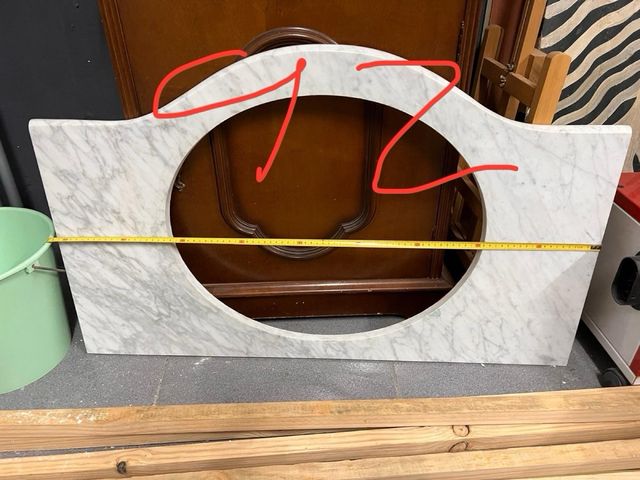 Lavabo encastre beige y piedra de marmol