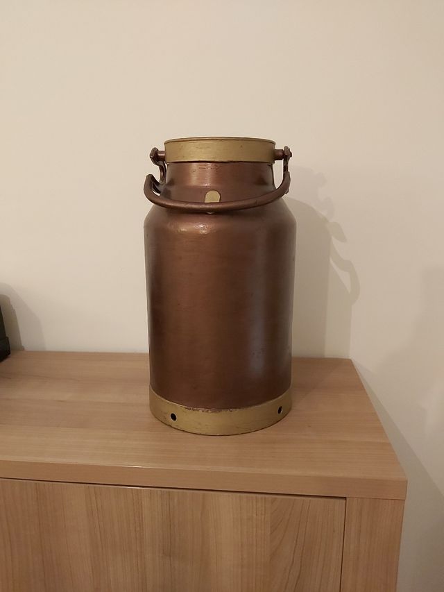 Lechera antigua restaurada