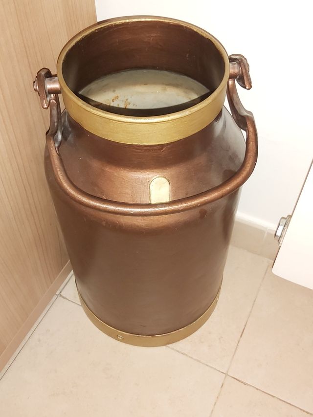 Lechera antigua restaurada