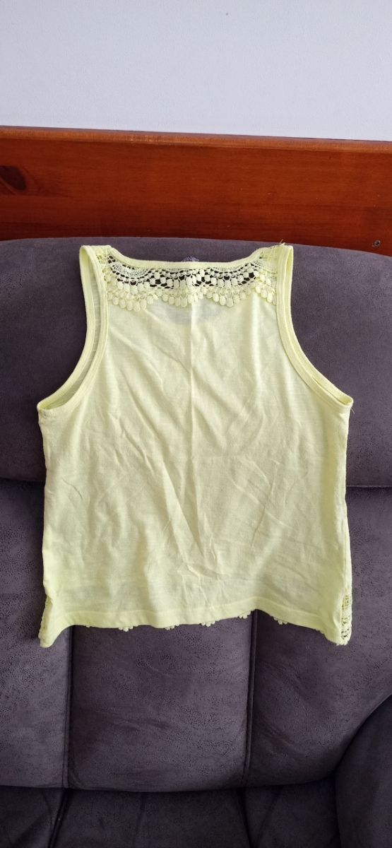 Top amarillo sin mangas de Primark