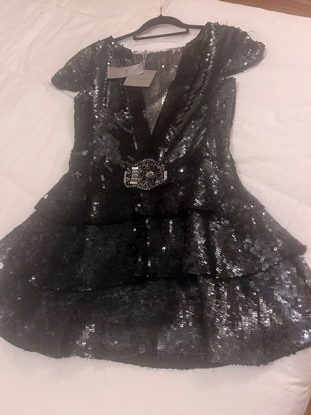 Vestido lentejuelas colección numerada de Uterqüe
