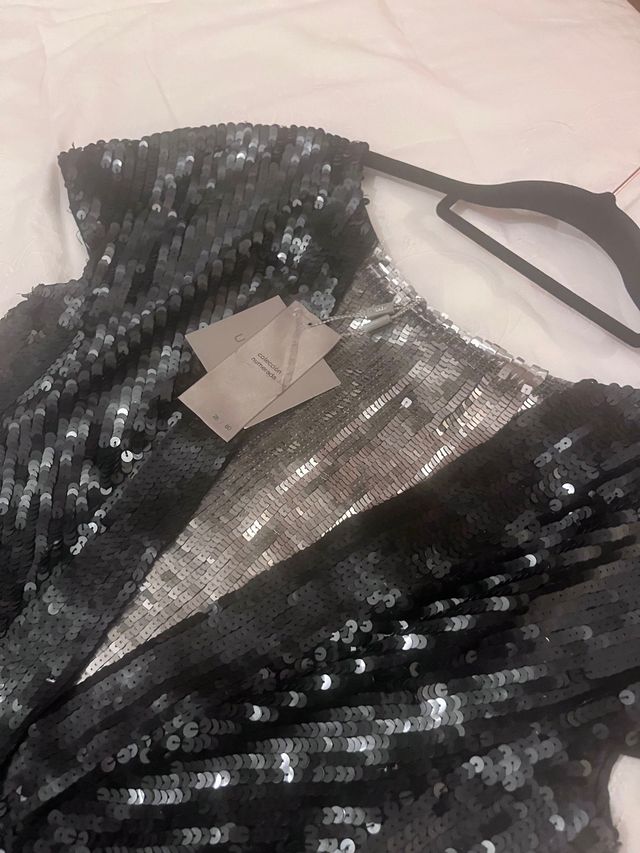 Vestido lentejuelas colección numerada de Uterqüe