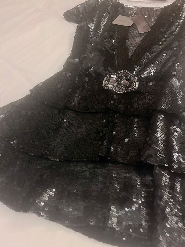 Vestido lentejuelas colección numerada de Uterqüe