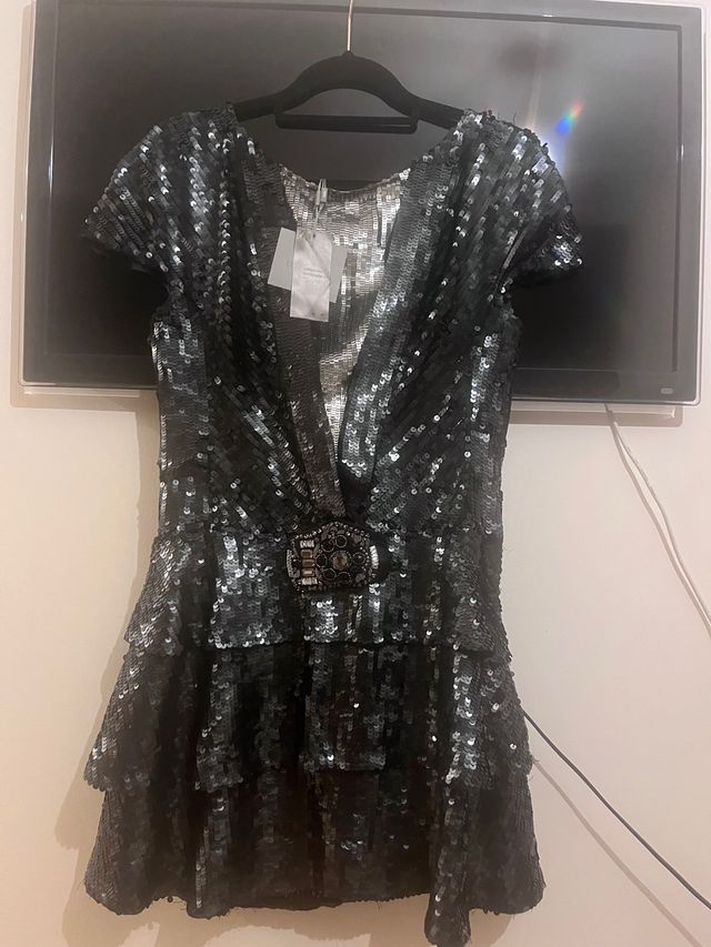 Vestido lentejuelas colección numerada de Uterqüe