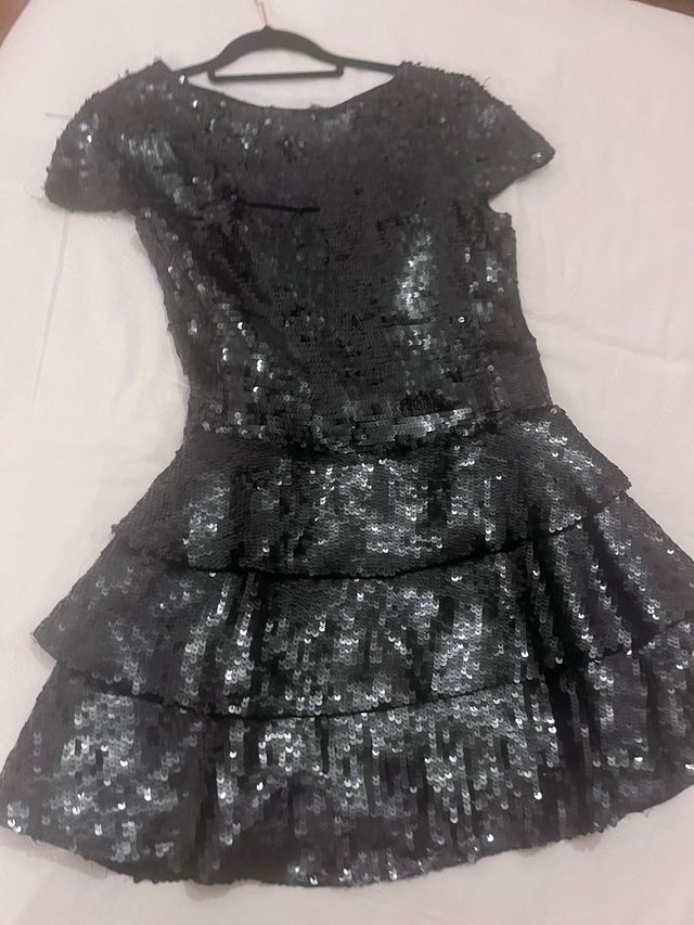 Vestido lentejuelas colección numerada de Uterqüe