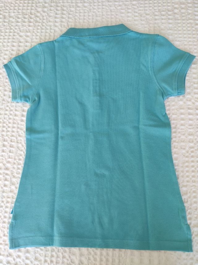 Polo niña turquesa T: 9-10