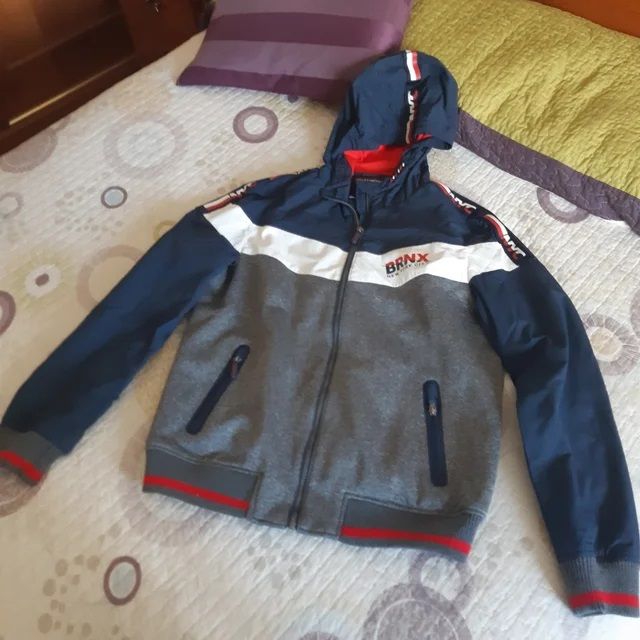 Chaqueta azul marino y gris C&A talla 176 cms.