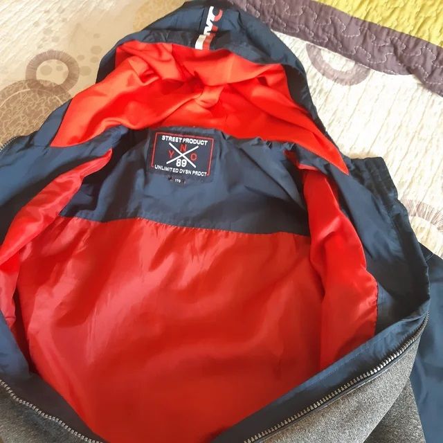 Chaqueta azul marino y gris C&A talla 176 cms.