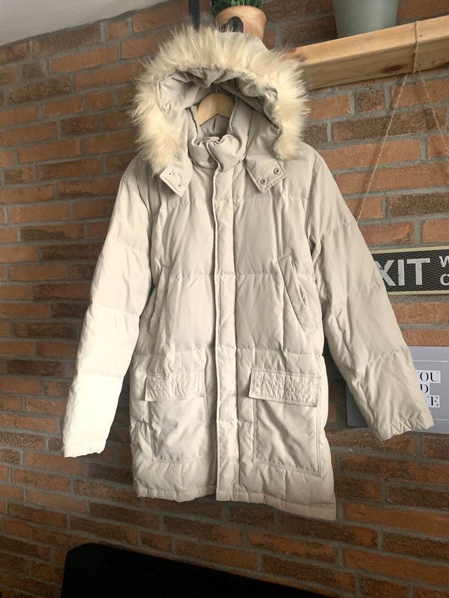 Piumino con pelo e cappuccio