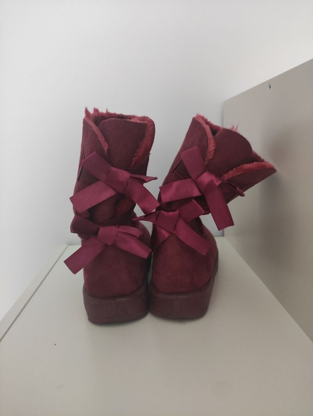 Botas de pelo burdeos