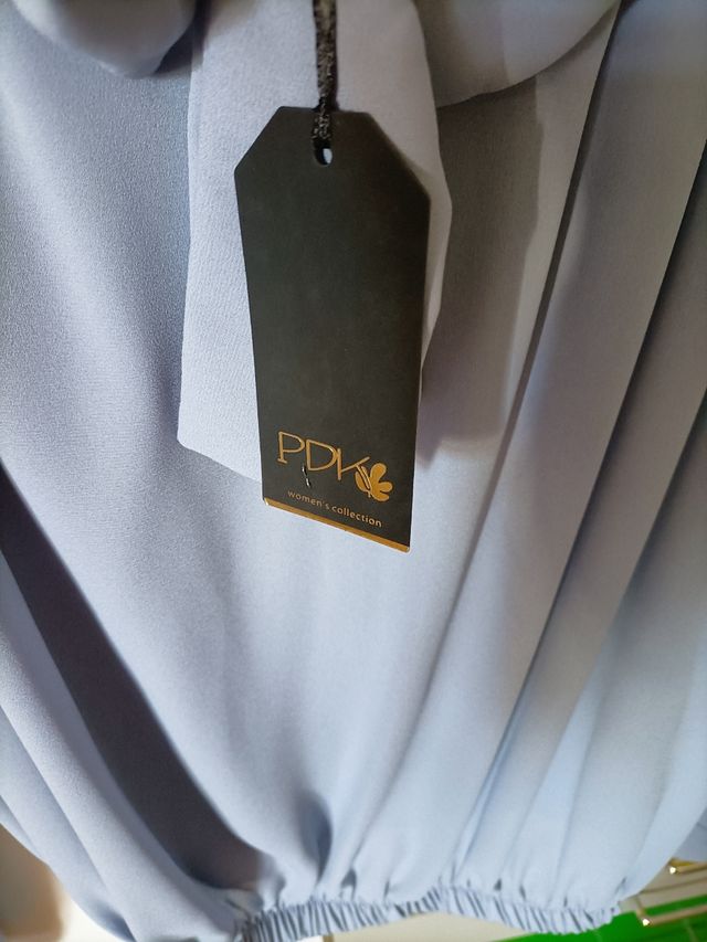 camicetta blusante con fiocco.