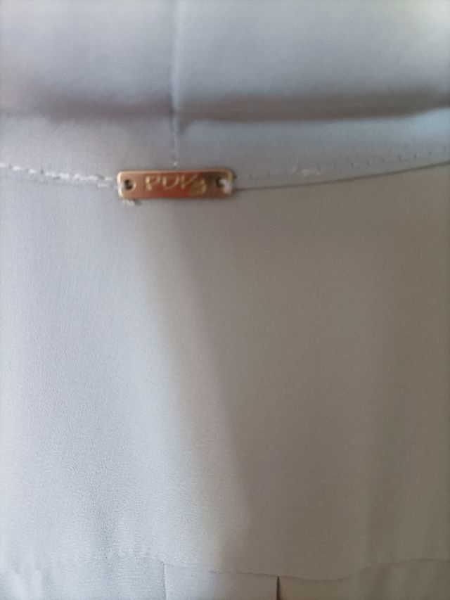 camicetta blusante con fiocco.