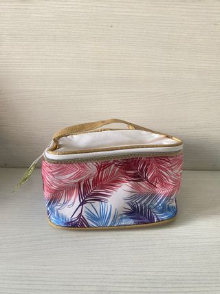 Neceser dorado con flores 