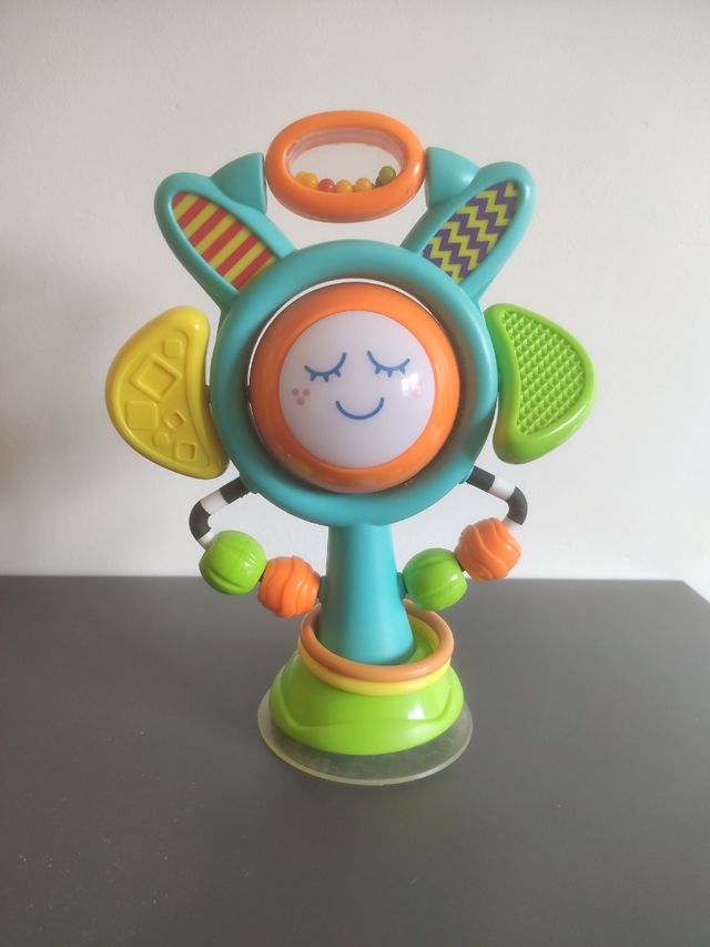 Flor musical sonajero con luces