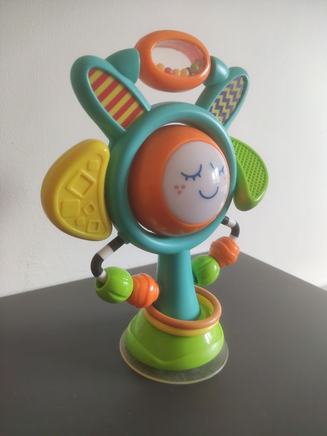 Flor musical sonajero con luces